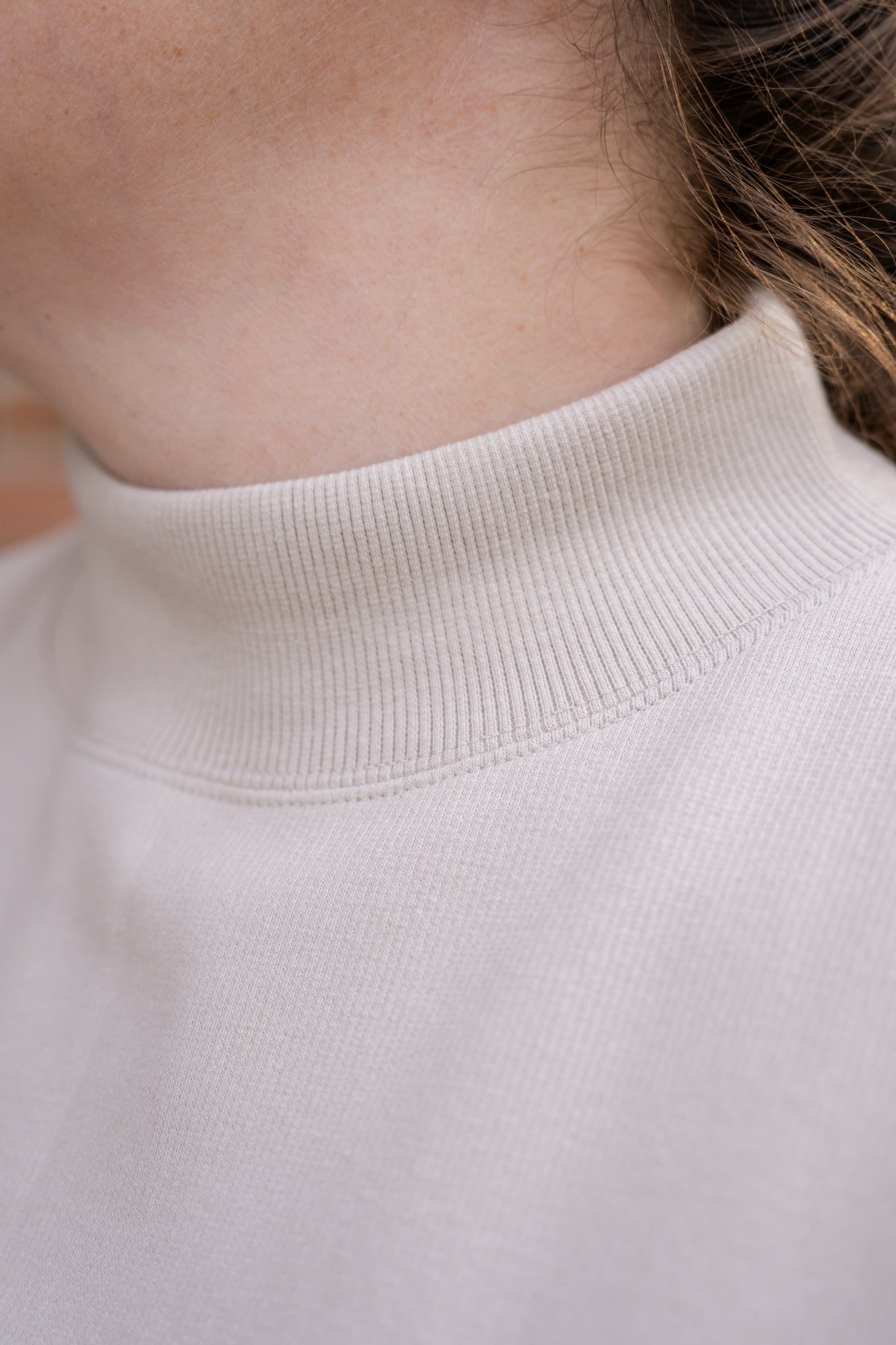 Sleeveless Tapered Mock Neck