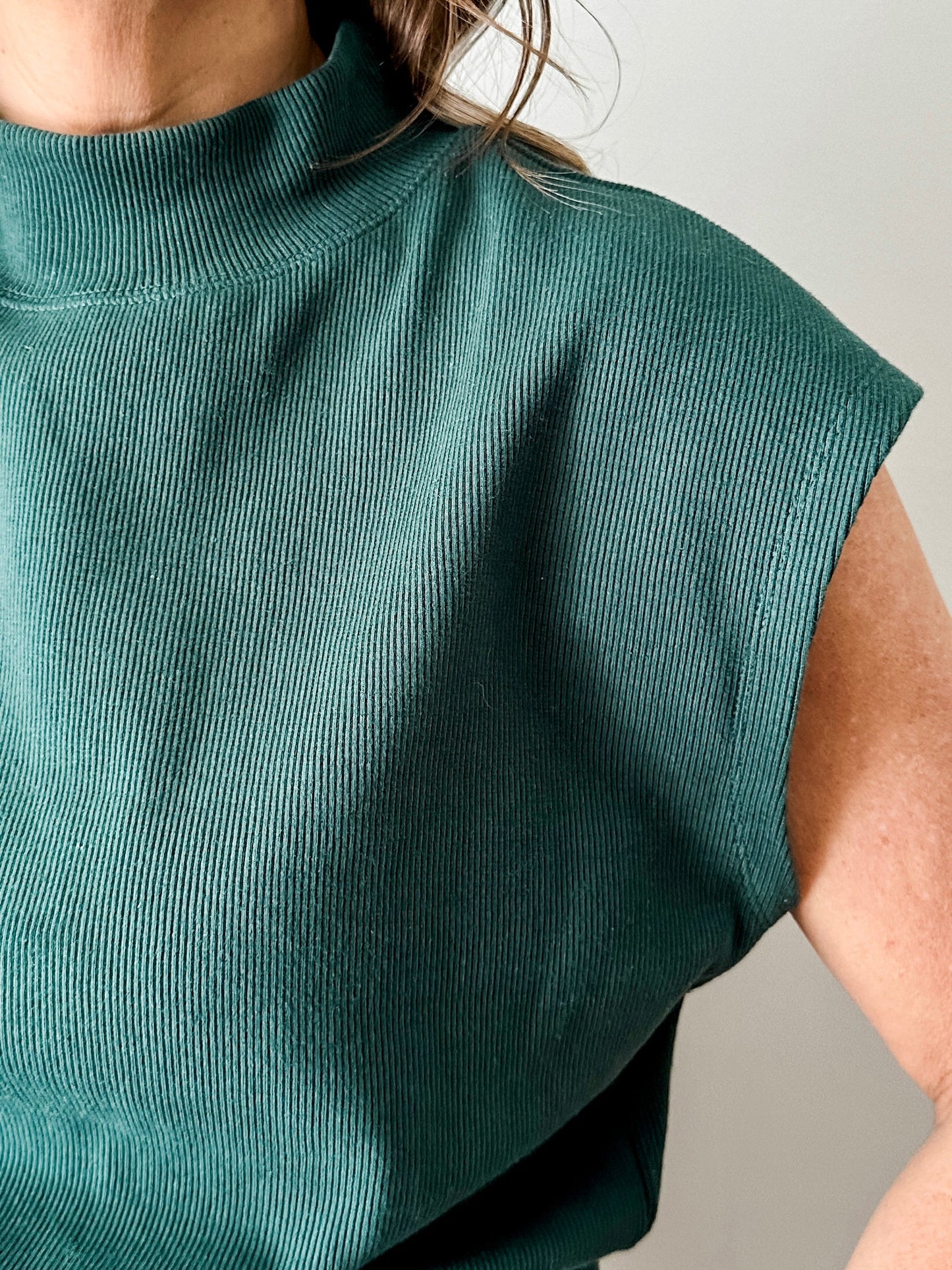Sleeveless Tapered Mock Neck